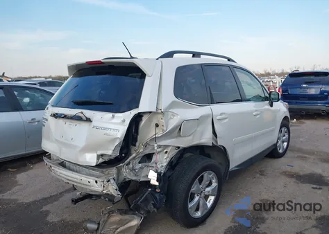 2014 Subaru Forester 2.5I Limited из США, поврежденный, VIN JF2SJAJC1EH400552